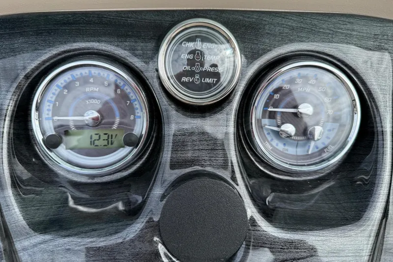 Slide: The Image of Dashboard of 2025 Tahoe 2185 with RPM and speed gauges. - 15
