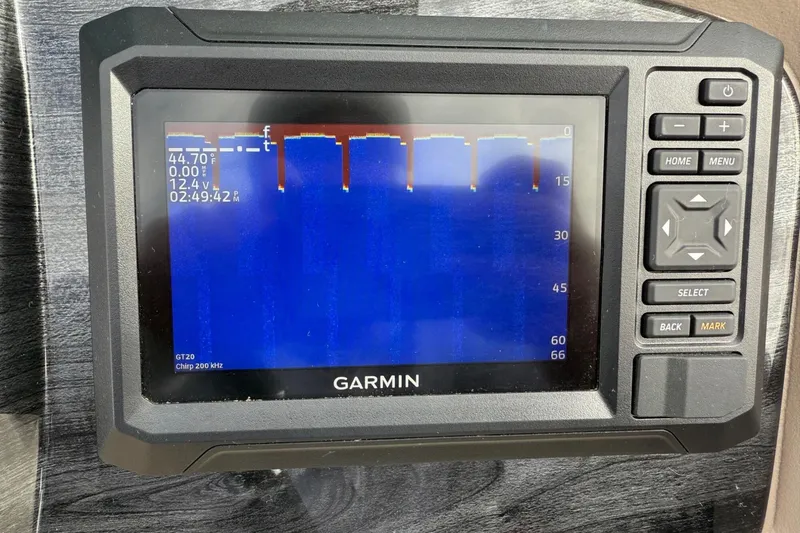 Slide: The Image of Garmin fishfinder display on Tahoe 2185, 2025 model, showing sonar readings and temperature. - 16