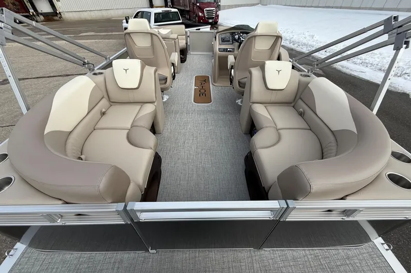 Slide: The Image of 2025 Tahoe 2185 pontoon boat interior with luxurious beige seating and modern design. - 9