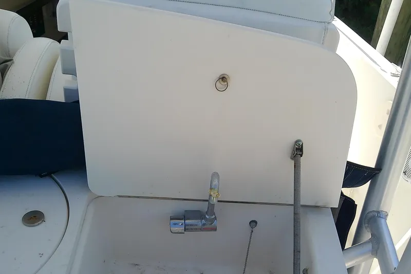 Slide: The Image of Simrad navigation display on 2001 Boston Whaler 28 Outrage, showing marine chart and data. - 12