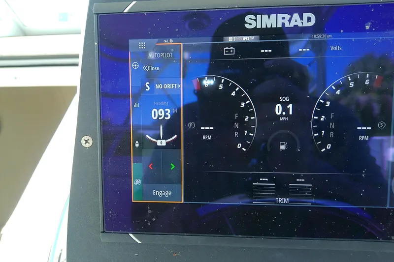 Slide: The Image of 2001 Boston Whaler 28 Outrage boat deck with storage compartments and seating. - 19