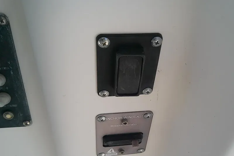 Slide: The Image of 2001 Boston Whaler 28 Outrage boat helm with Simrad navigation system. - 26