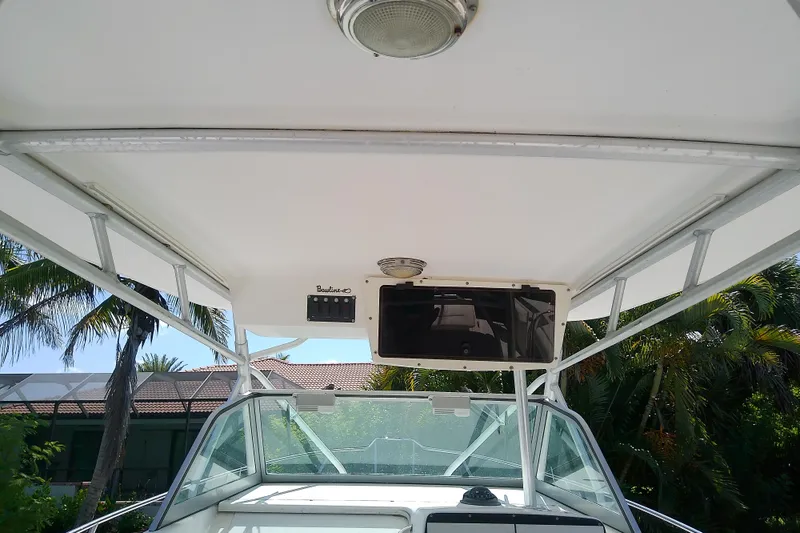 Slide: The Image of Dashboard of a 2001 Boston Whaler 28 Outrage with Simrad electronics and gauges. - 7