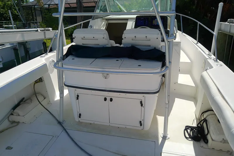 Slide: The Image of Dashboard of a 2001 Boston Whaler 28 Outrage with Simrad navigation displays. - 8