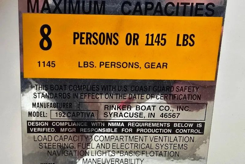 Slide: The Image of 2005 Rinker 192 Captiva BR capacity label: 8 persons or 1145 lbs, U.S. Coast Guard compliant. - 16