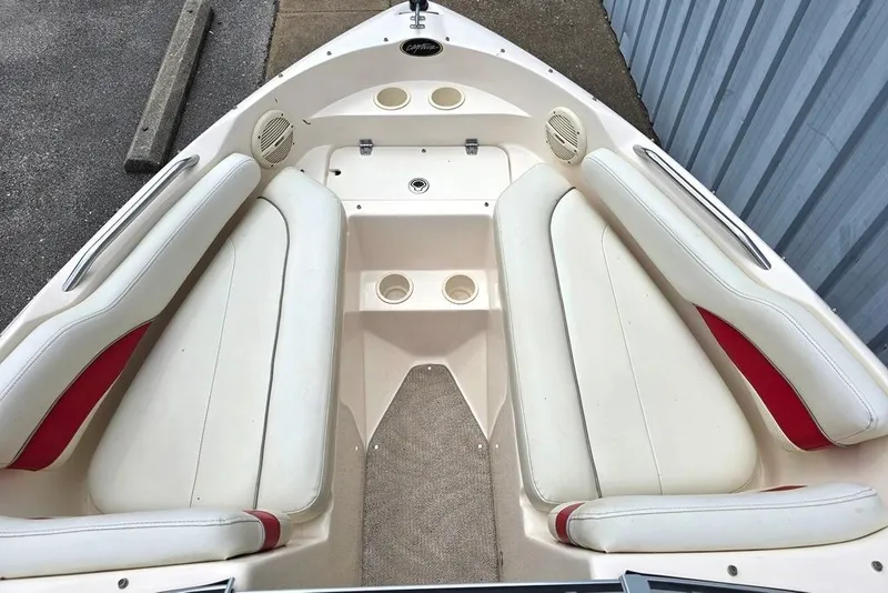 Slide: The Image of 2005 Rinker 192 Captiva BR boat interior with white and red seating. - 5