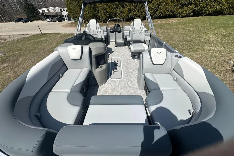 Slide: The Image of 2025 Tahoe 2185 boat interior with spacious seating and modern design. - 13