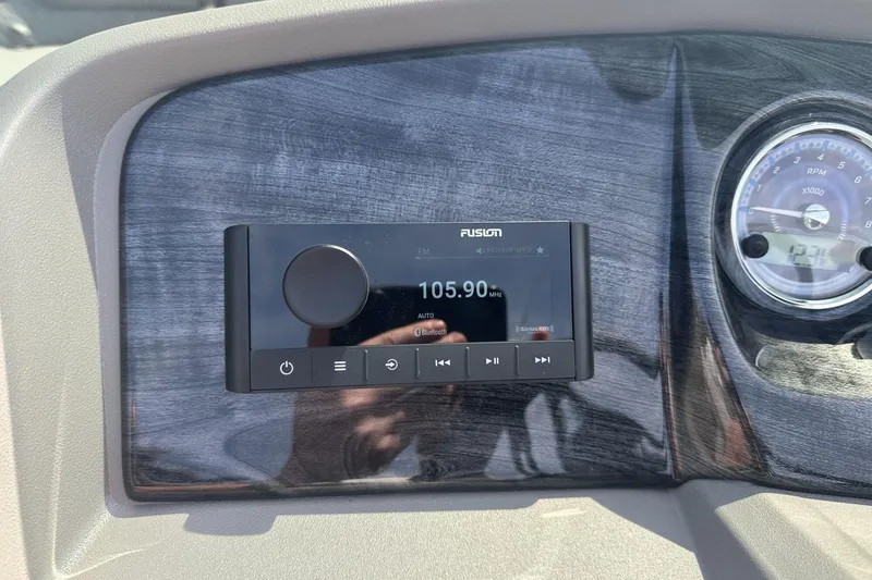 Slide: The Image of Dashboard of 2025 Tahoe 2185 with Fusion radio and RPM gauge. - 20