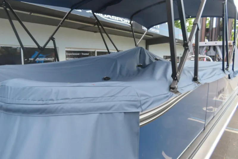 Slide: The Image of 2025 Avalon 2385 LSZ Versatile Rear Lounger, covered, in Sarasota, FL dealership. - 12