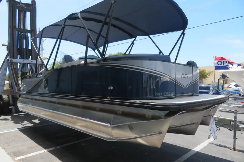 Slide: The Image of 2025 Avalon 2385 LSZ Versatile Rear Lounger luxury tri-toon boat in Sarasota, FL. - 24