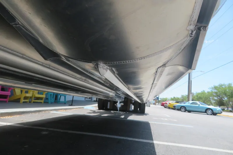 Slide: The Image of Underside view of 2025 Avalon 2385 LSZ Versatile Rear Lounger in Sarasota, FL parking lot. - 32