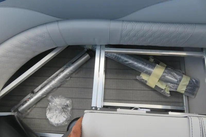 Slide: The Image of 2025 Avalon 2385 LSZ Versatile Rear Lounger interior storage compartment with wrapped components. - 40