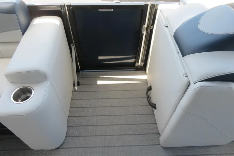 Slide: The Image of 2025 Avalon 2385 LSZ Versatile Rear Lounger interior with luxury seating and cup holder. - 53