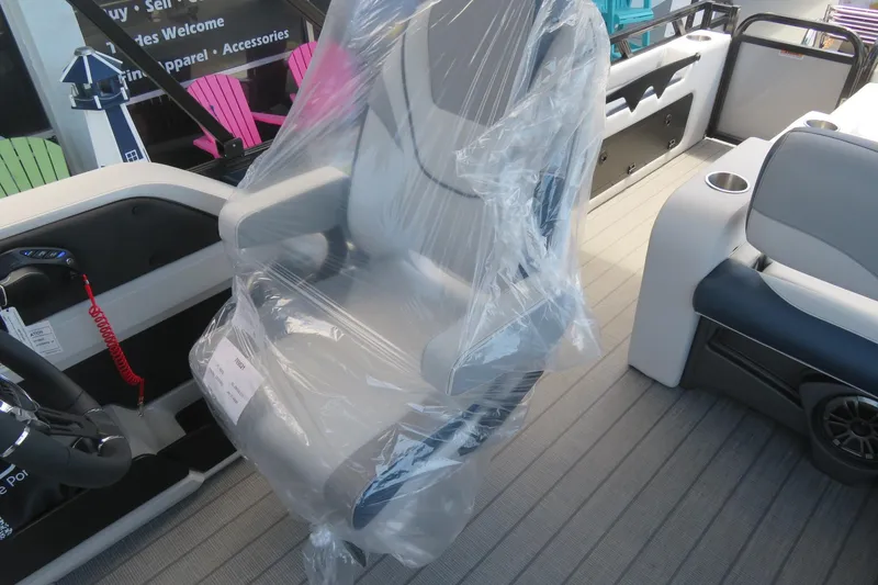 Slide: The Image of 2025 Avalon 2385 LSZ Versatile Rear Lounger interior with wrapped captain's chair, Sarasota, FL. - 56
