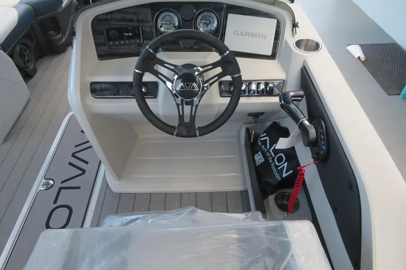 Slide: The Image of 2025 Avalon 2385 LSZ Versatile Rear Lounger dashboard with Garmin navigation, Sarasota, FL. - 57