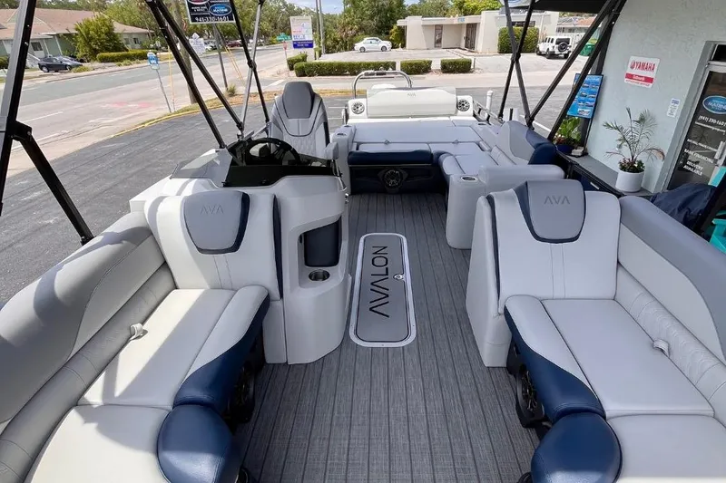 Slide: The Image of Luxurious 2025 Avalon 2385 LSZ Versatile Rear Lounger Tri-toon interior in Sarasota, FL. - 7