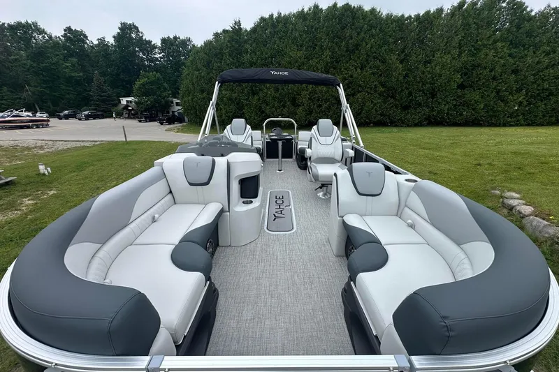 Slide: The Image of 2025 Tahoe 2185 pontoon boat with luxurious seating and sleek design. - 12
