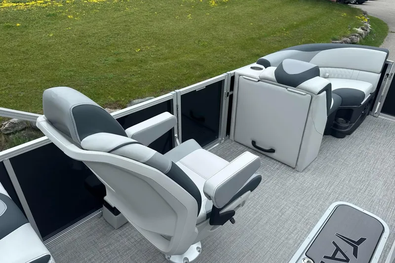 Slide: The Image of 2025 Tahoe 2185 boat interior with modern seating and sleek design. - 24