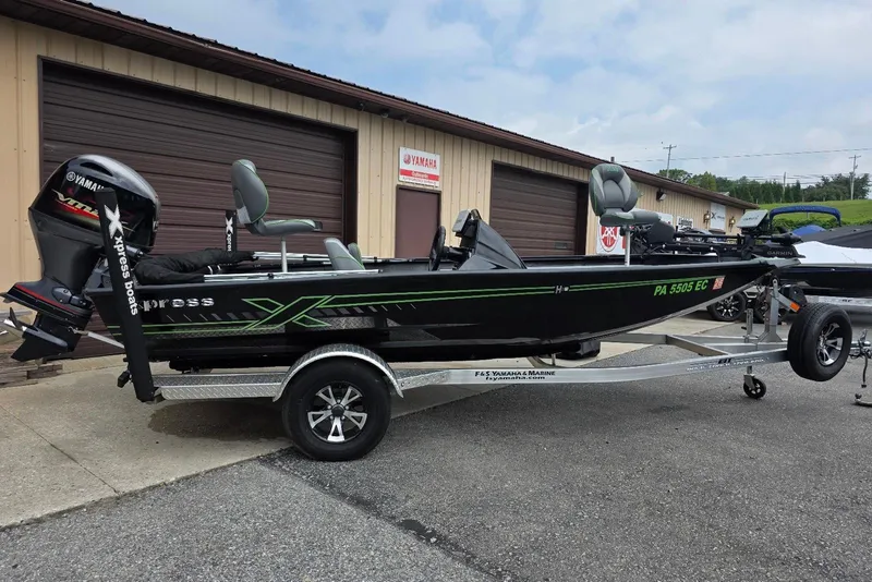 Slide: The Image of 2022 Xpress H18 Bass boat with Yamaha Vmax 115 SHO engine on trailer. - 1