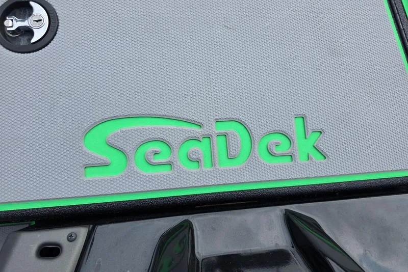 Slide: The Image of SeaDek logo on Xpress H18 Bass boat deck, 2022 model. - 11