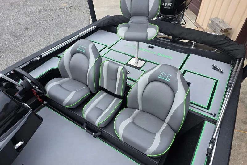Slide: The Image of 2022 Xpress H18 Bass boat interior with Yamaha Vmax 115 SHO engine, featuring gray and green seating. - 15