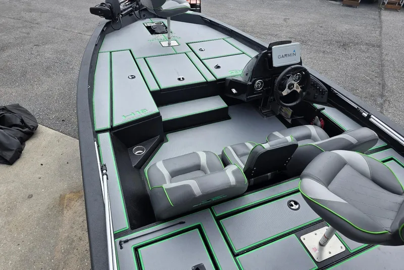 Slide: The Image of 2022 Xpress H18 Bass boat interior with Yamaha Vmax 115 SHO engine, featuring Garmin electronics. - 8