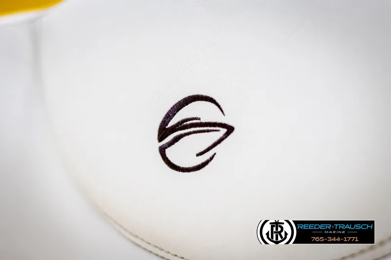 Slide: The Image of Close-up of Crownline 21 SS 2007 logo on white surface, Reeder-Trausch Marine branding. - 38