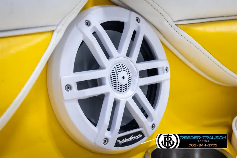 Slide: The Image of White Rockford Fosgate speaker on yellow interior of 2007 Crownline 21 SS boat. - 39