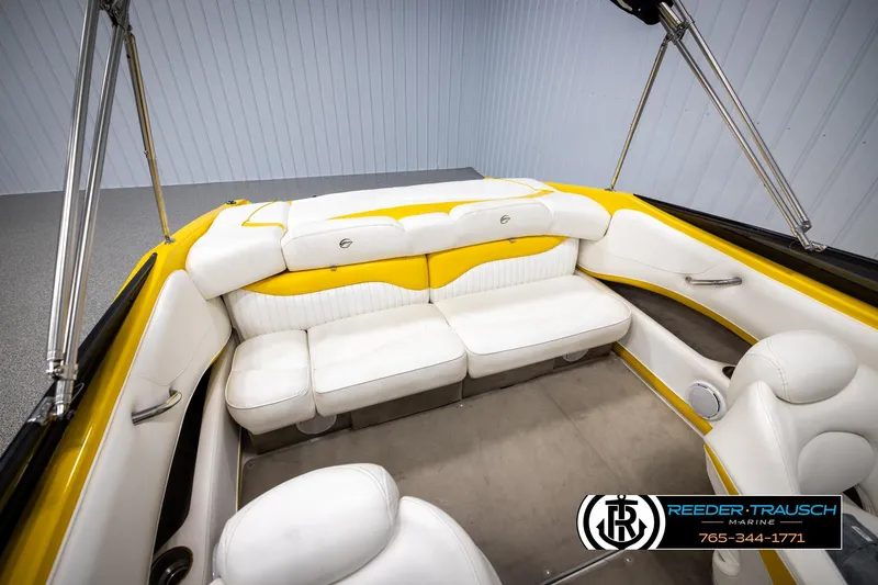 Slide: The Image of 2007 Crownline 21 SS boat interior with white and yellow seating, Reeder-Trausch Marine logo. - 41