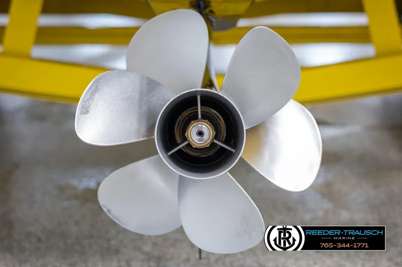 Slide: The Image of Close-up of a 2007 Crownline 21 SS boat propeller with Reeder-Trausch Marine logo. - 48