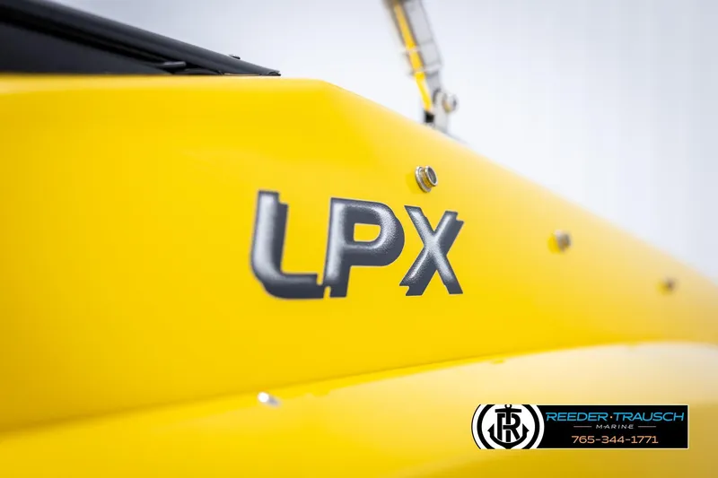 Slide: The Image of Yellow 2007 Crownline 21 SS boat with LPX logo, Reeder-Trausch Marine branding. - 49