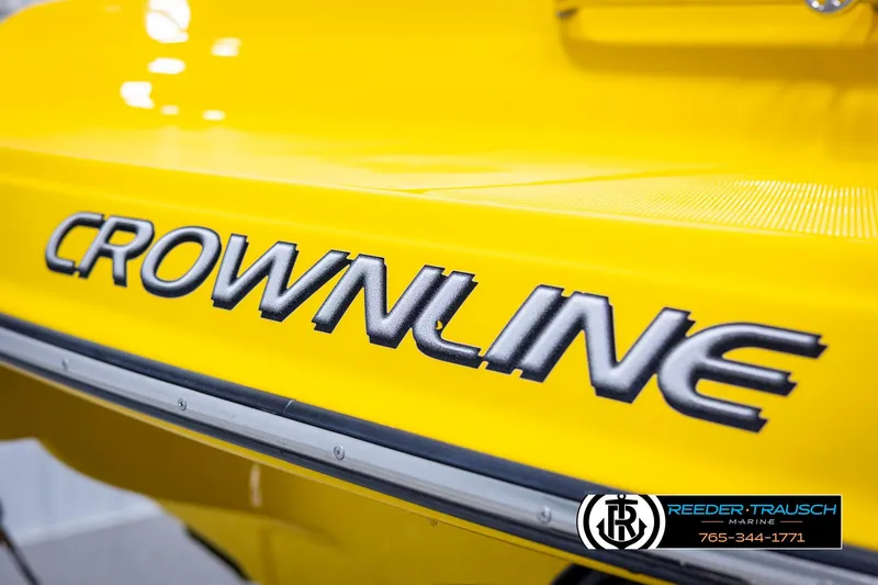 Slide: The Image of Yellow 2007 Crownline 21 SS boat with bold logo, showcased by Reeder-Trausch Marine. - 51