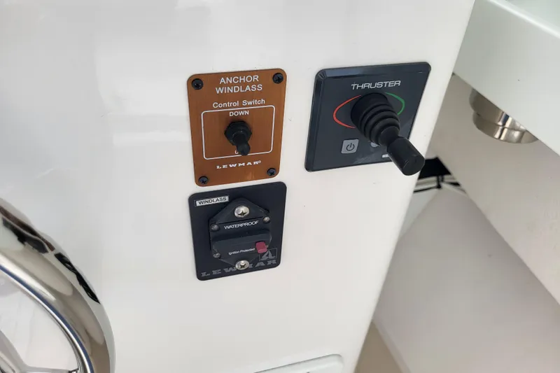 Slide: The Image of Control panel of 2023 Steiger Craft 31 Fisherman with anchor windlass and thruster switches. - 15