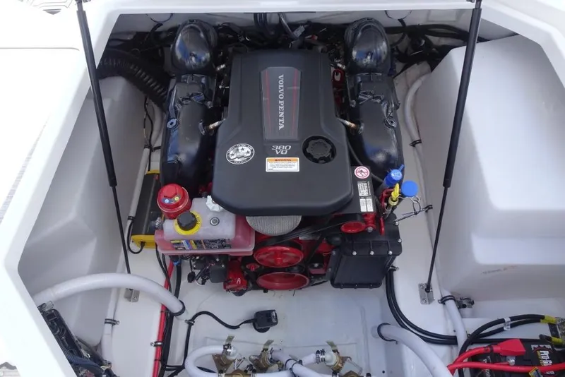 Slide: The Image of Engine compartment of 2026 Cobalt R8 Surf boat, featuring a Volvo Penta V8 engine. - 24