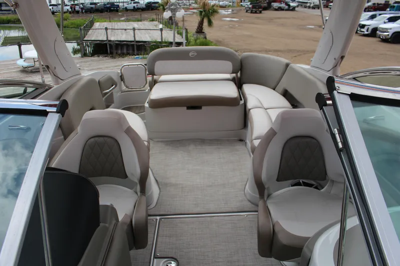 Slide: The Image of 2023 Crownline 290 SS boat interior with luxurious seating and modern design. - 10