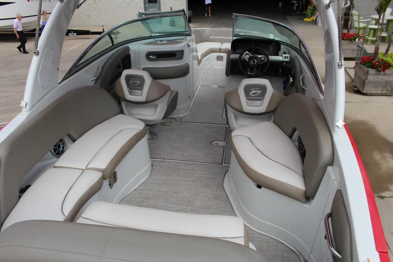 Slide: The Image of 2023 Crownline 290 SS boat interior with luxurious seating and modern design. - 12