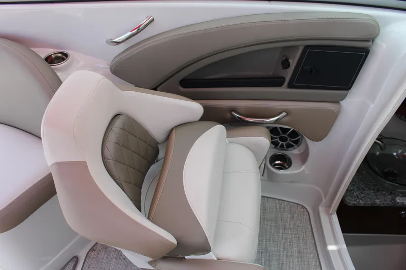 Slide: The Image of 2023 Crownline 290 SS boat interior with luxurious seating and modern design. - 7