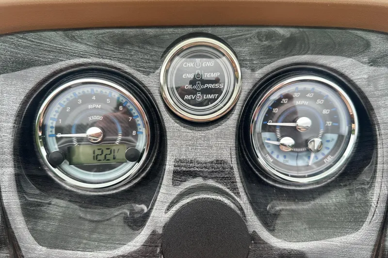 Slide: The Image of Dashboard of 2025 Tahoe 2185 with RPM, speedometer, and engine indicators. - 17