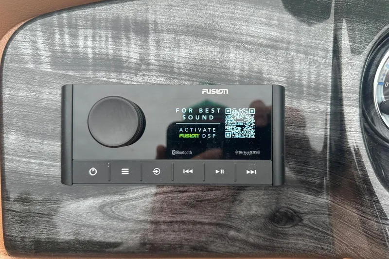 Slide: The Image of 2025 Tahoe 2185 audio system with Fusion DSP activation display and control panel. - 18