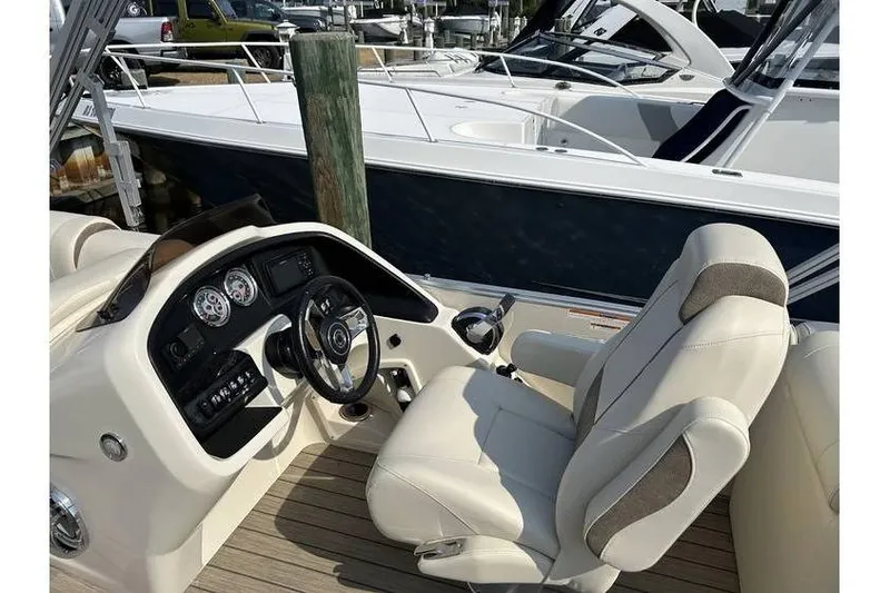 Slide: The Image of Luxury boat interior with steering console and plush seating, Avalon 2785, 2021 model. - 6