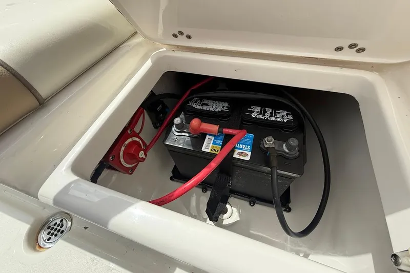 Slide: The Image of Battery compartment of 2019 Key West 203 DFS boat with wiring and switch. - 22