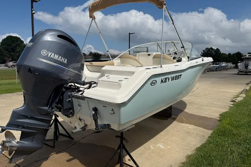 Slide: The Image of 2019 Key West 203 DFS boat with Yamaha engine on display outdoors. - 4