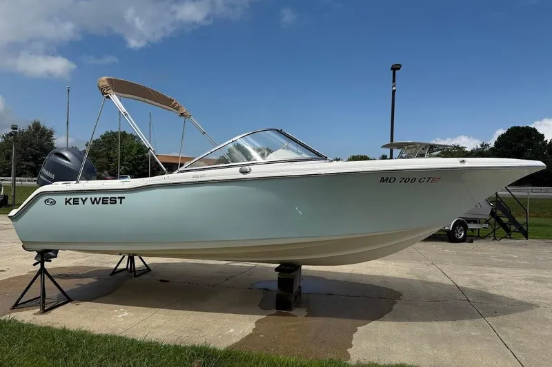 Slide: The Image of 2019 Key West 203 DFS boat on display, featuring a Yamaha outboard motor. - 5