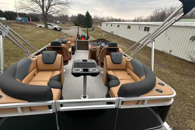 Slide: The Image of 2025 Tahoe 2185 pontoon boat with luxurious seating and modern design. - 10