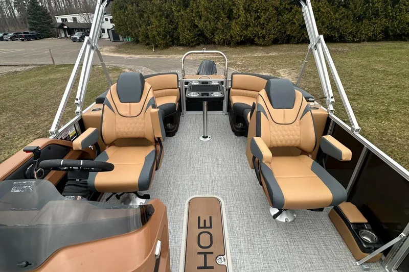 Slide: The Image of 2025 Tahoe 2185 boat interior with luxurious seating and modern design. - 11