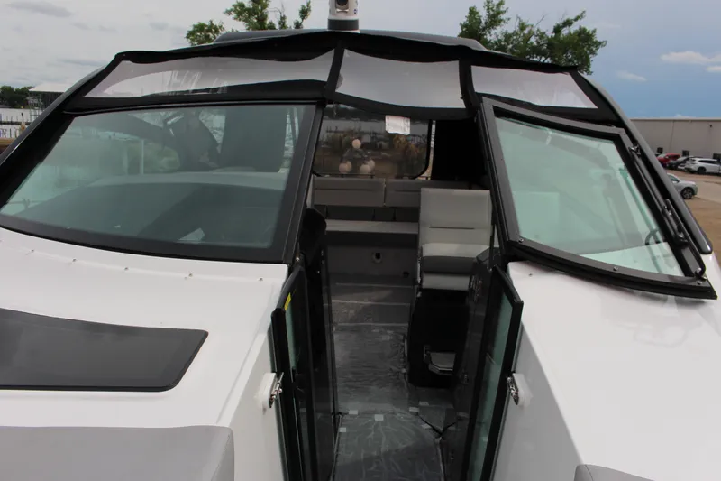 Slide: The Image of 2022 Cobalt A36 boat with open cockpit and sleek design. - 4