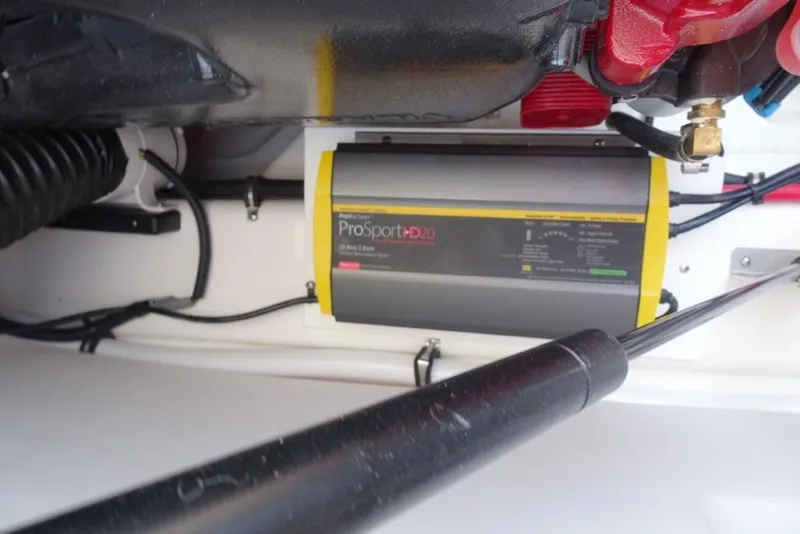 Slide: The Image of Battery charger in 2026 Cobalt R8 Surf boat engine compartment. - 23