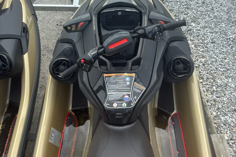 Slide: The Image of 2025 Sea-Doo RXT-X 325 jet ski dashboard with controls and display. - 10