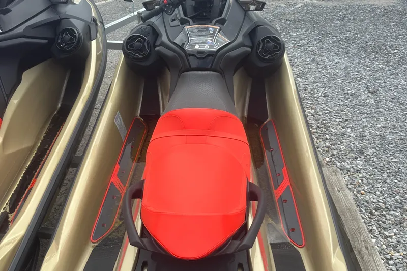 Slide: The Image of 2025 Sea-Doo RXT-X 325 jet ski with red seat and black handlebars. - 9