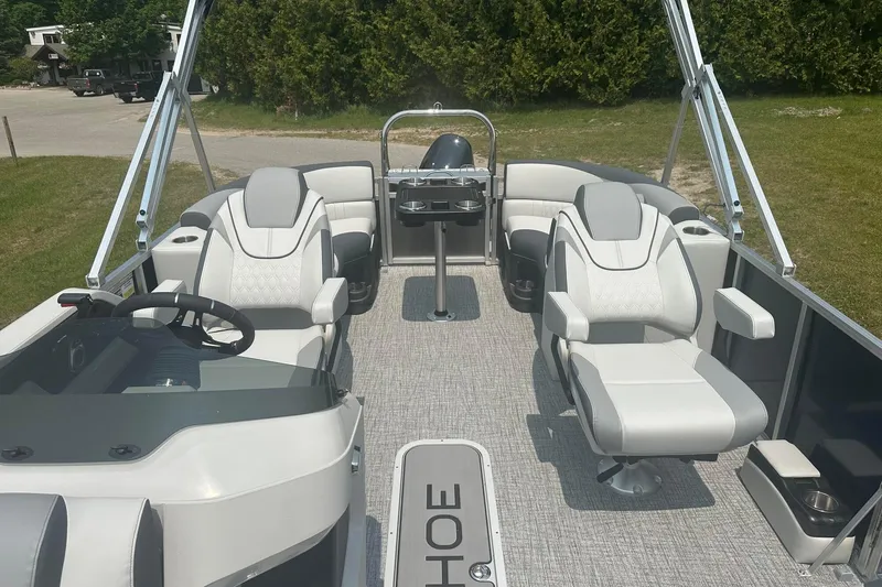 Slide: The Image of 2025 Tahoe 2185 pontoon boat interior with luxurious seating and modern design. - 10